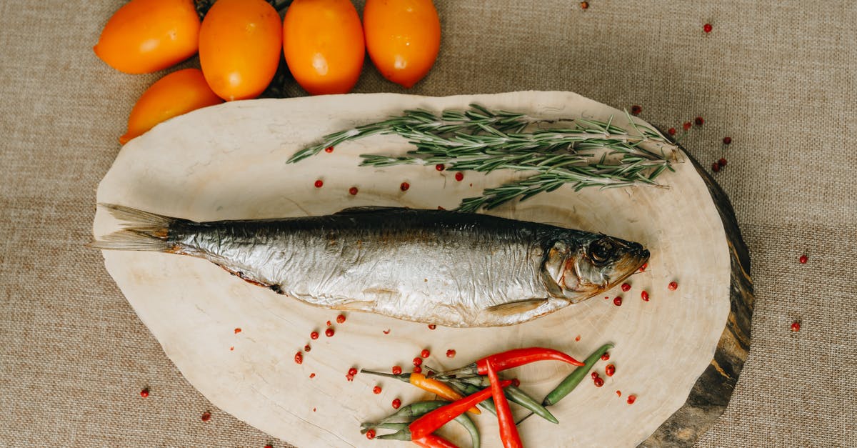 Is pickled herring cooked? - Silver Fish on White Textile Is pickled herring cooked? - Silver Fish on White Textile