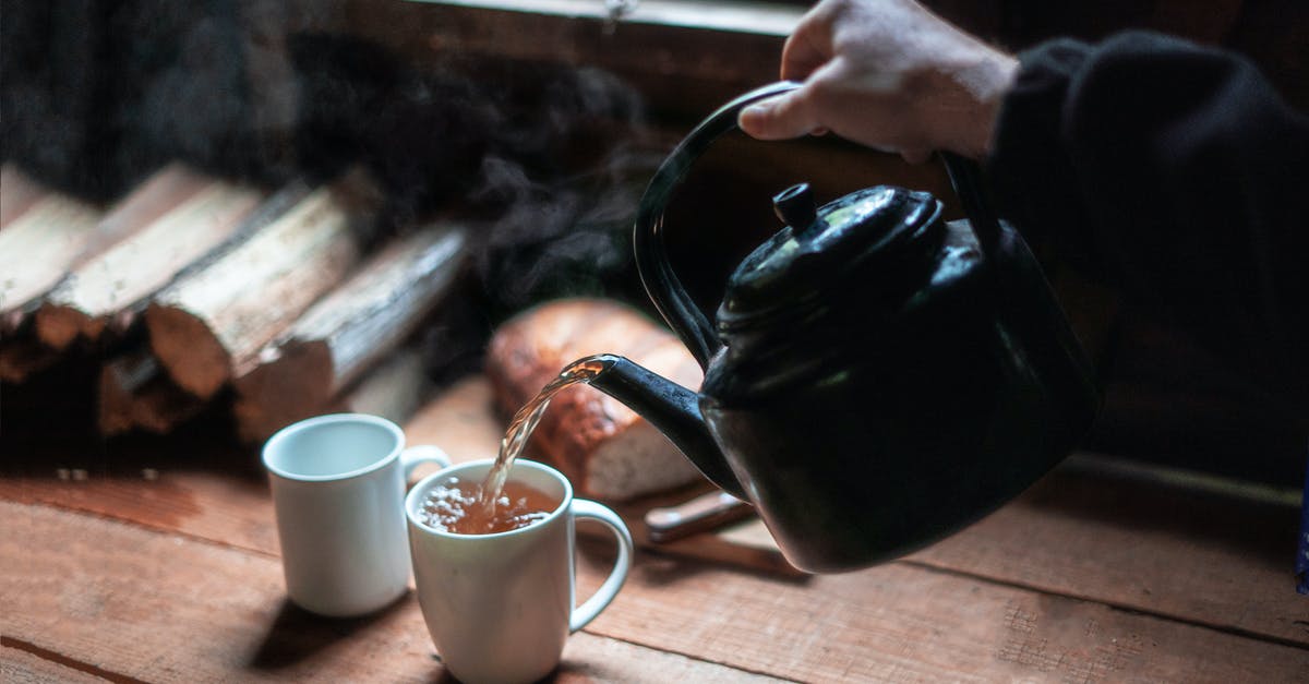 Is pouring hot stock into a blender safe? - Person Pouring Tea In White Ceramic Mug Is pouring hot stock into a blender safe? - Person Pouring Tea In White Ceramic Mug