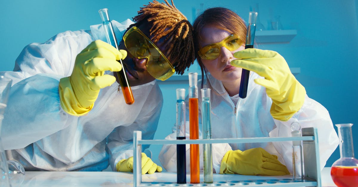 Is "until juices run clear" a valid test for poultry doneness? Why or why not? - A Man and a Woman Holding a Test Tube Is "until juices run clear" a valid test for poultry doneness? Why or why not? - A Man and a Woman Holding a Test Tube