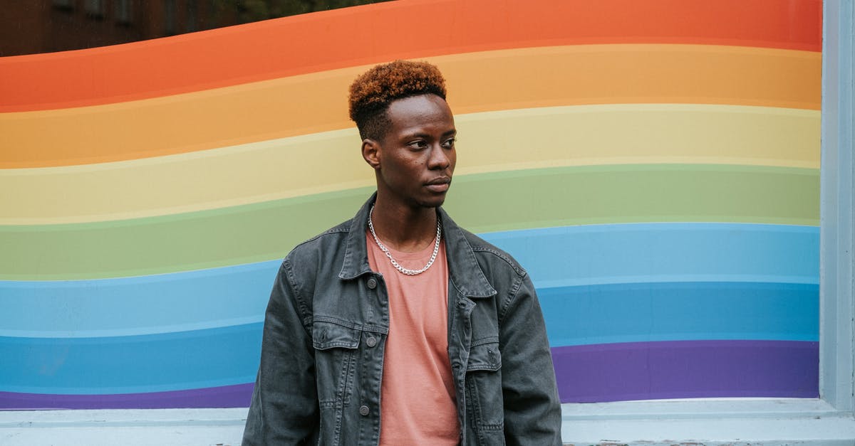 Is Shochu an acceptable alternative to Awamori? - Contemplative black man standing against window painted in LGBT colors Is Shochu an acceptable alternative to Awamori? - Contemplative black man standing against window painted in LGBT colors