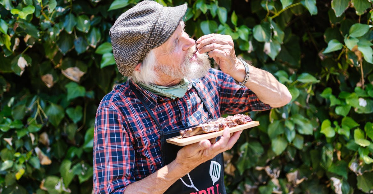 Is smell a bad way of determining whether meat is still good? - Elderly Man in Plaid Dress Shirt Holding a Wooden Board with Meat Is smell a bad way of determining whether meat is still good? - Elderly Man in Plaid Dress Shirt Holding a Wooden Board with Meat