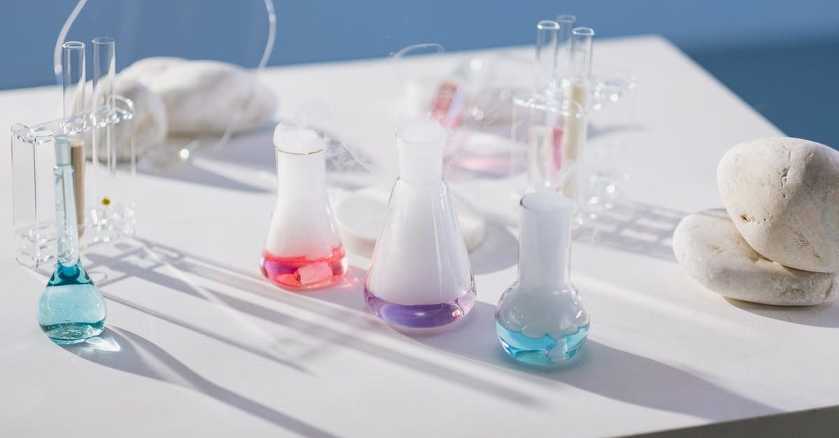 Is steam lost in boiling negligible? - Liquids Boiling in Flasks on Table Is steam lost in boiling negligible? - Liquids Boiling in Flasks on Table