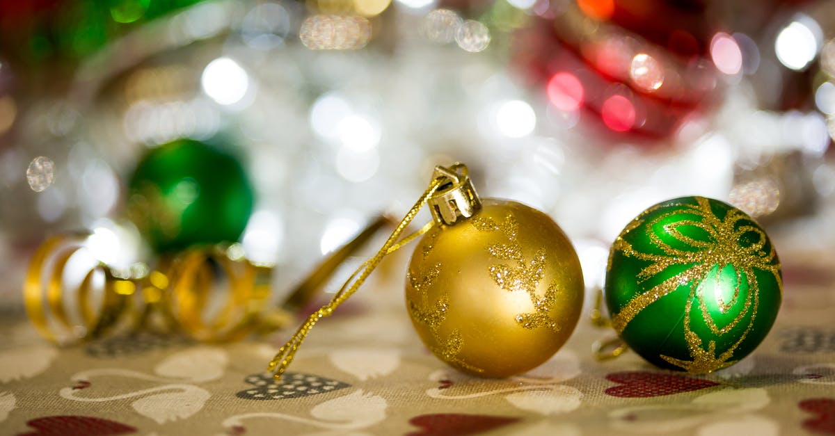 Is Tamarind String Edible? [closed] - Gold and Green Baubles on White Textile