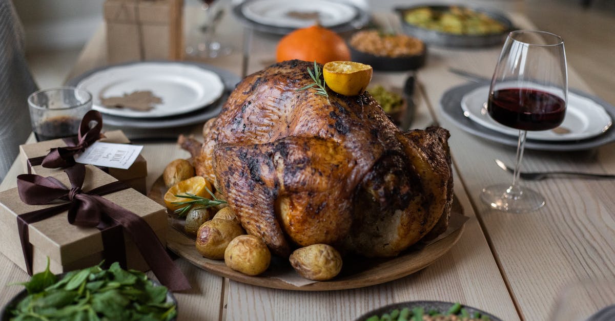Is the oily liquid from roasting a turkey worth keeping? - High angle of appetizing roasted turkey and glasses of wine with other dishes placed on wooden table prepared for celebrating Thanksgiving Day Is the oily liquid from roasting a turkey worth keeping? - High angle of appetizing roasted turkey and glasses of wine with other dishes placed on wooden table prepared for celebrating Thanksgiving Day