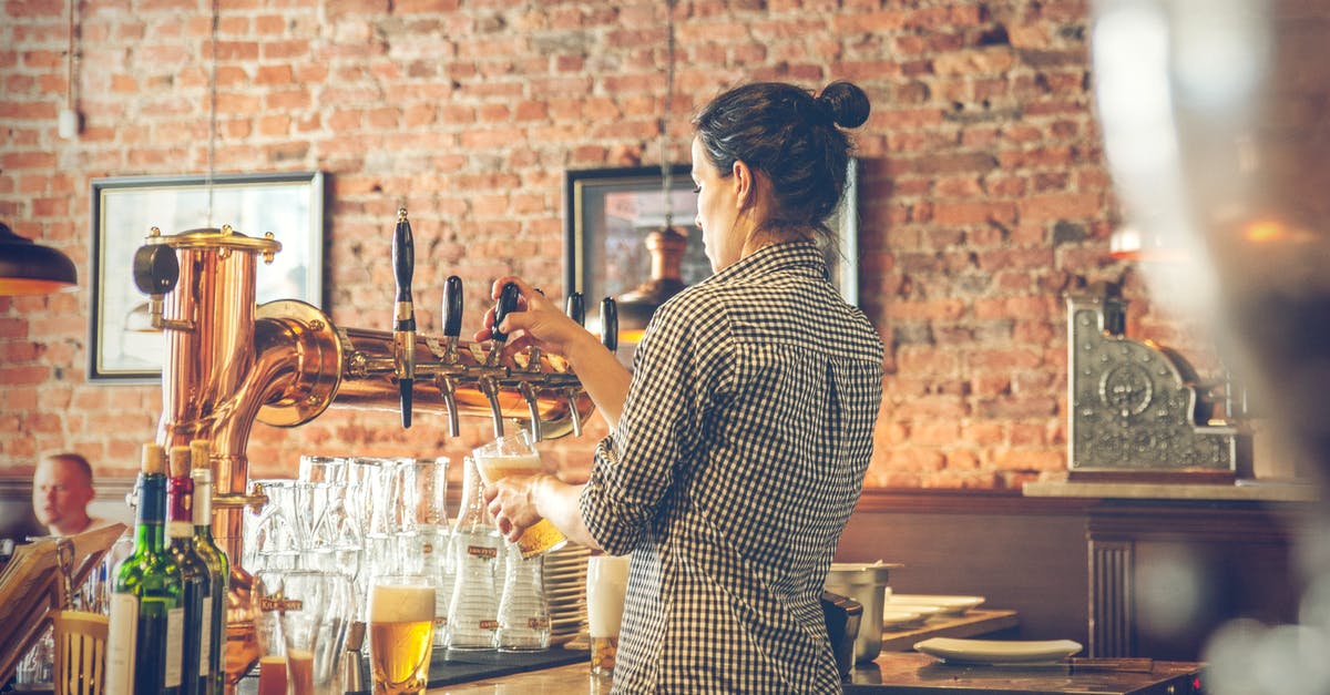 Is the pouring method of beer really important? - Photo of Bartender Pouring Draught Beer Is the pouring method of beer really important? - Photo of Bartender Pouring Draught Beer