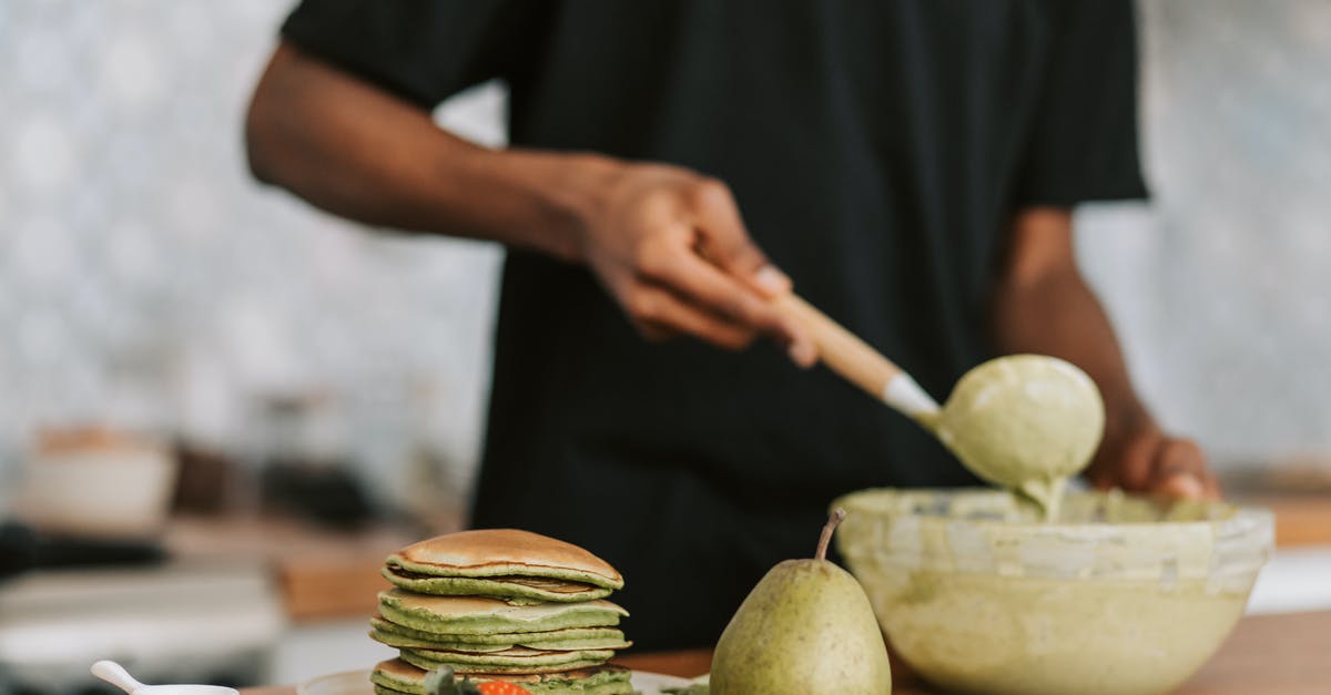 Is there a formula for converting pancake batter to waffle batter? - A Person Mixing Batter in a Bowl Is there a formula for converting pancake batter to waffle batter? - A Person Mixing Batter in a Bowl
