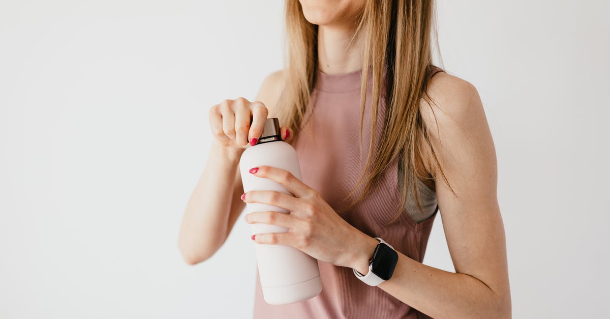 Is there a maximum amount of time heavy cream can be fermented? - Crop faceless young female in casual outfit wearing smart watch opening cosmetic bottle while standing against white background Is there a maximum amount of time heavy cream can be fermented? - Crop faceless young female in casual outfit wearing smart watch opening cosmetic bottle while standing against white background