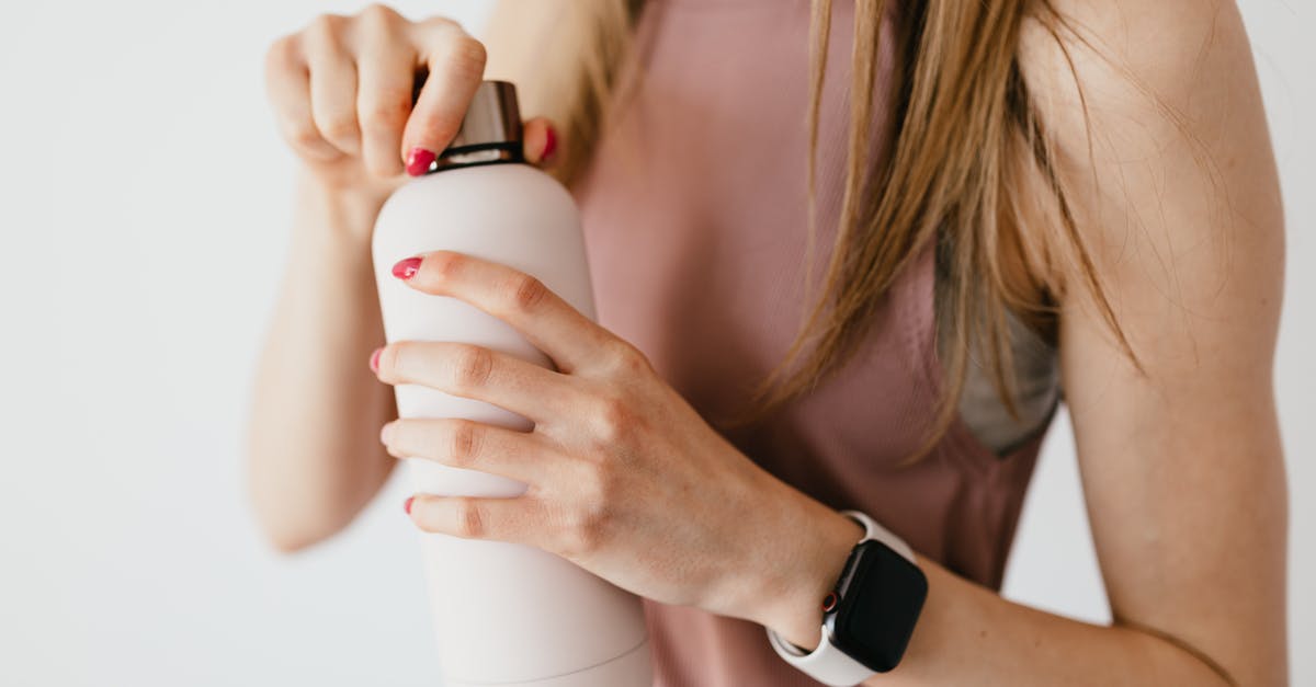 Is there a maximum amount of time heavy cream can be fermented? - Crop faceless young female in casual outfit wearing smart watch opening cosmetic bottle on white background Is there a maximum amount of time heavy cream can be fermented? - Crop faceless young female in casual outfit wearing smart watch opening cosmetic bottle on white background