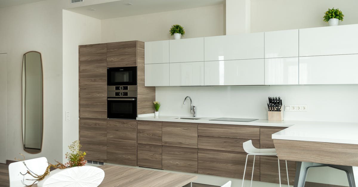 Is there a technique to making Caramel in a Microwave oven? - Spacious kitchen with modern furniture and appliances in minimalist apartment Is there a technique to making Caramel in a Microwave oven? - Spacious kitchen with modern furniture and appliances in minimalist apartment
