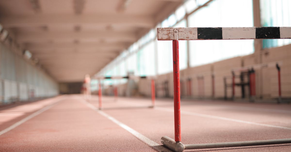Is there a way to re-crystallize or temper goat butter? - Hurdle painted in white black and red colors placed on empty rubber running track in soft focus Is there a way to re-crystallize or temper goat butter? - Hurdle painted in white black and red colors placed on empty rubber running track in soft focus