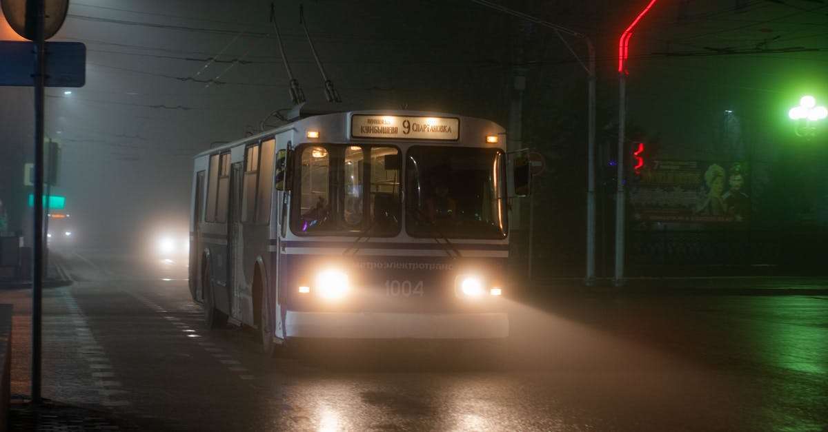 Is there a way to revive an old potato? - Old trolleybus driving along wet asphalt road in small city at foggy night Is there a way to revive an old potato? - Old trolleybus driving along wet asphalt road in small city at foggy night