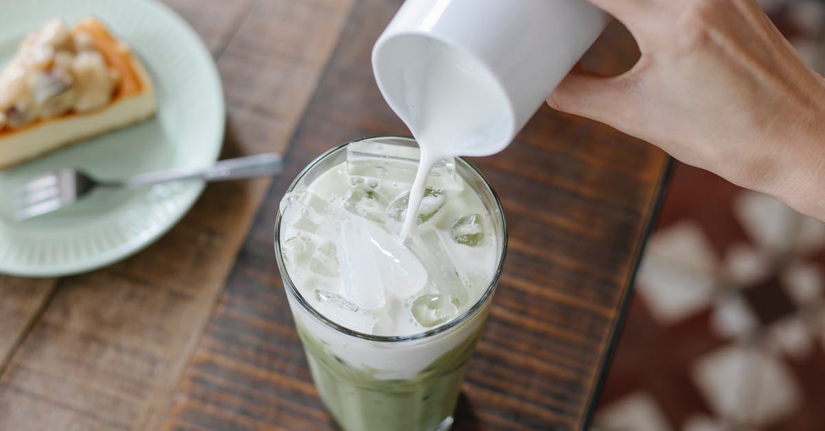 Is there an alternative to condensed milk? - Crop unrecognizable woman adding milk to iced matcha tea Is there an alternative to condensed milk? - Crop unrecognizable woman adding milk to iced matcha tea