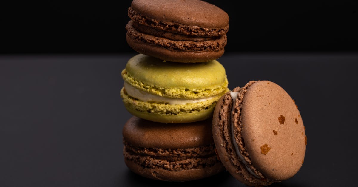 Is there an alternative to spreading flour when rolling the dough? - Tasty sweet macaroons on black table Is there an alternative to spreading flour when rolling the dough? - Tasty sweet macaroons on black table