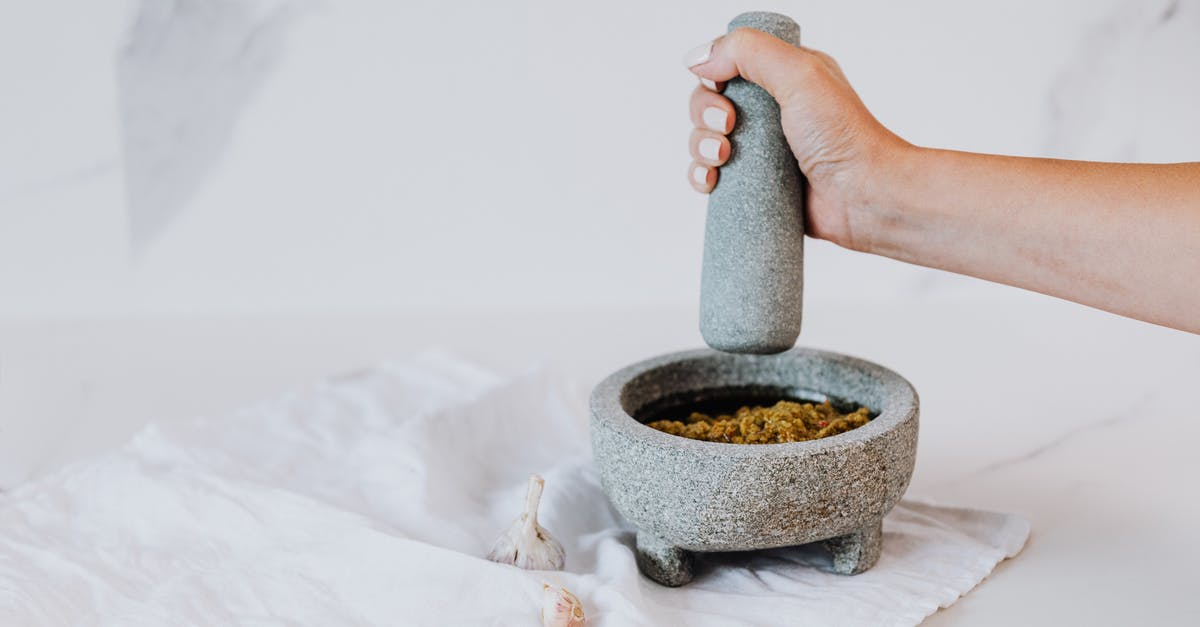 Is there any diminishing return on grinding spices for a "tea"? - Person Holding Gray Mortar and Pestle Is there any diminishing return on grinding spices for a "tea"? - Person Holding Gray Mortar and Pestle