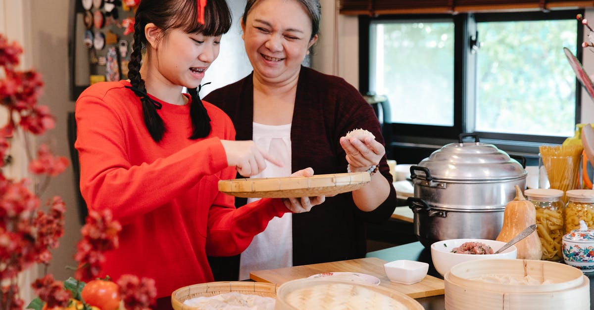 Is there any point in considering sous vide for unskilled newbie cook? - Asian grandmother cooking dumplings with granddaughter