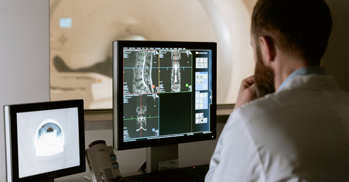 Is there such a thing as a bone cleaver? - Photo Of Doctor Looking Deeply Unto The Screen Is there such a thing as a bone cleaver? - Photo Of Doctor Looking Deeply Unto The Screen