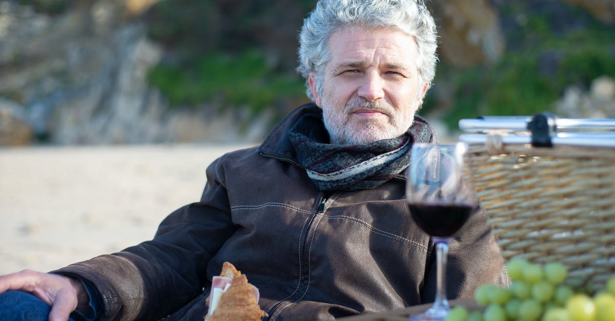 Is there such thing as letting bread rest for too long? - Man Sitting Holding a Bread Is there such thing as letting bread rest for too long? - Man Sitting Holding a Bread