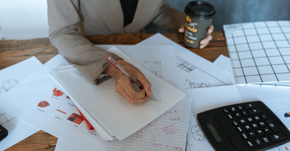 Is this coffee ratio calculation correct? - A Person Writing while Holding a Cup of Coffee Is this coffee ratio calculation correct? - A Person Writing while Holding a Cup of Coffee