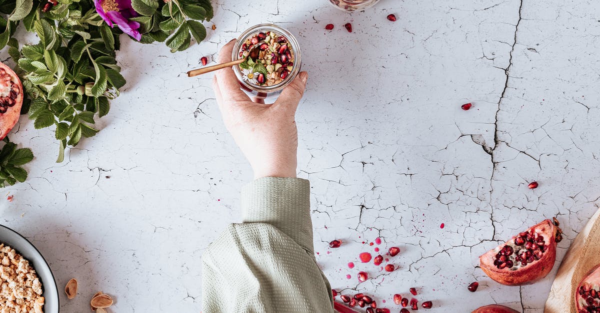 Is this Pomegranate Molasses rescuable? - Person Holding Green Plant on White Ceramic Bowl Is this Pomegranate Molasses rescuable? - Person Holding Green Plant on White Ceramic Bowl