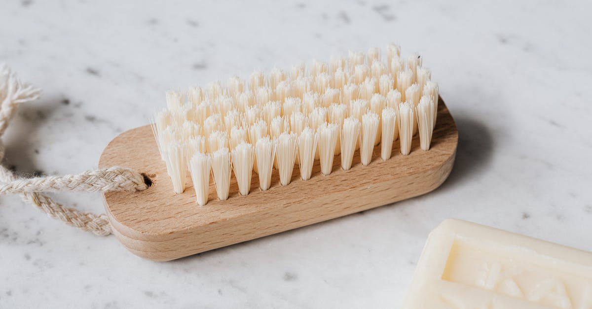 Is using treated wood safe for smoking meat? - Cleaning brush and soap on marble table Is using treated wood safe for smoking meat? - Cleaning brush and soap on marble table