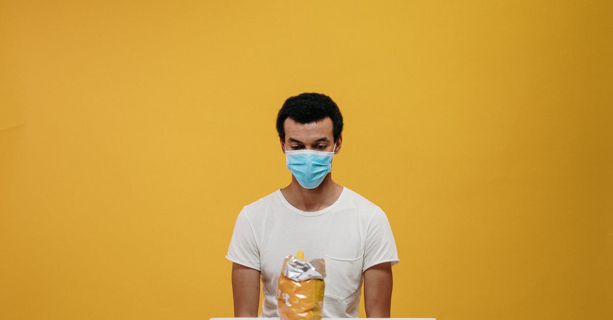 Is Virginia creeper safe to eat? - Man in White Crew Neck T-shirt Wearing Blue Face Mask Sitting by the Table Is Virginia creeper safe to eat? - Man in White Crew Neck T-shirt Wearing Blue Face Mask Sitting by the Table