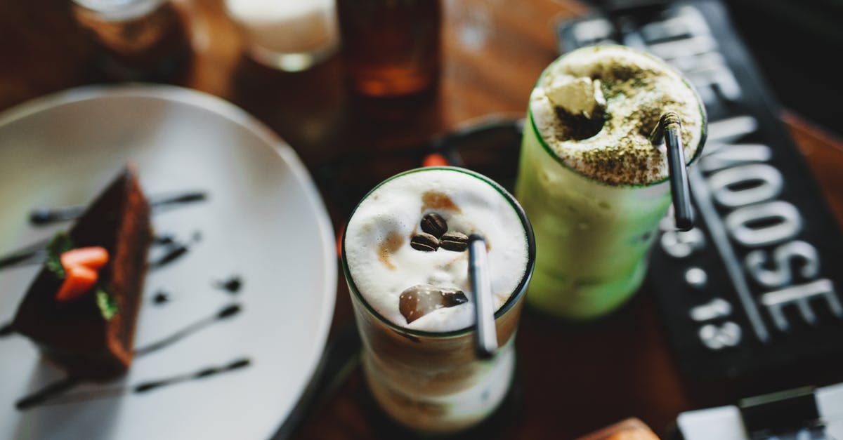 iSi Gourmet Whip Plus - 0.5l or 1l? - From above of delicious refreshing assorted milkshakes placed on table in cafe with chocolate cake iSi Gourmet Whip Plus - 0.5l or 1l? - From above of delicious refreshing assorted milkshakes placed on table in cafe with chocolate cake