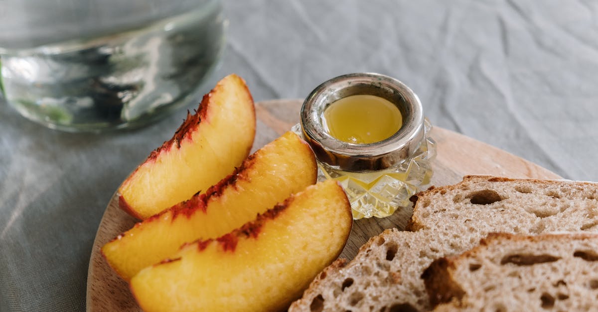 Jam with honey & without pectin has a saucy consistency always - Sliced Orange Fruit on Brown Bread Jam with honey & without pectin has a saucy consistency always - Sliced Orange Fruit on Brown Bread