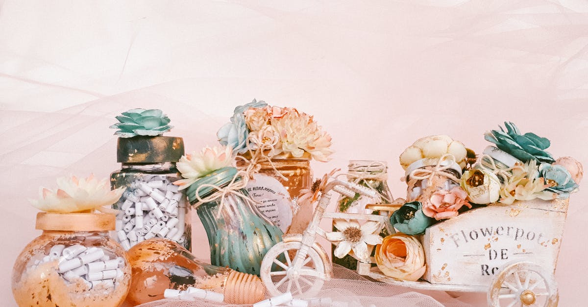 Jars didn't seal - Decorative Arrangement of Flowers in Jars and on a Miniature Vintage Carriage Jars didn't seal - Decorative Arrangement of Flowers in Jars and on a Miniature Vintage Carriage