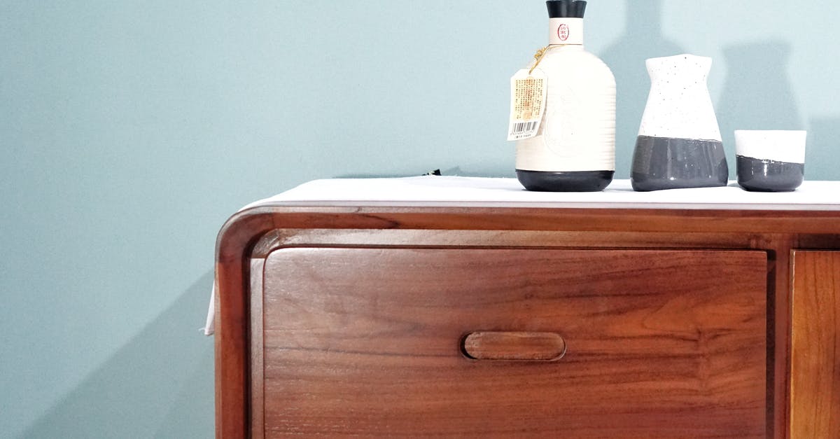 Jars didn't seal - Ceramic Jars on a Wooden Cabinet Jars didn't seal - Ceramic Jars on a Wooden Cabinet