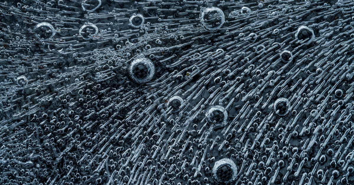 Jason's Deli has two different kinds of soft serve, what's the difference? [closed] - Macro shot of bird feather with interesting texture containing droplets and short lines