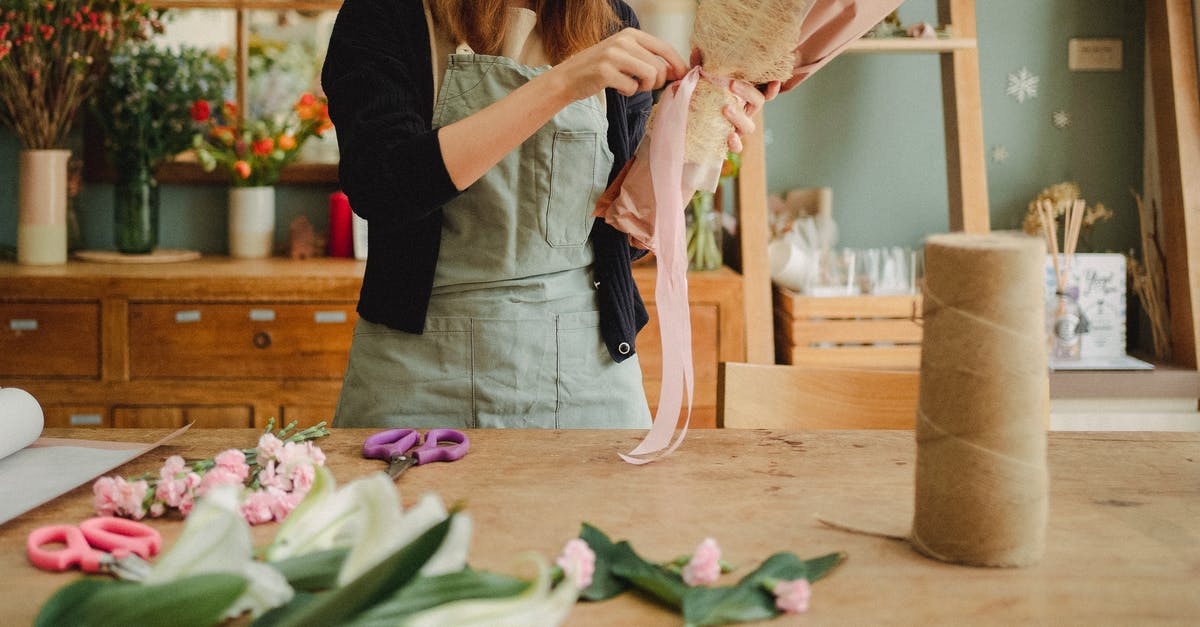 Kabobs to Fajitas - how to make the meat tender - Crop unrecognizable female florist wearing apron standing near table in contemporary light floristry shop and arranging bouquets Kabobs to Fajitas - how to make the meat tender - Crop unrecognizable female florist wearing apron standing near table in contemporary light floristry shop and arranging bouquets