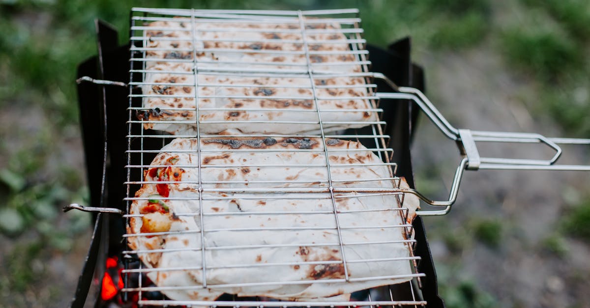 Keep chicken with skin from catching on fire on the barbeque - Process of grilling meat and vegetables in lavash Keep chicken with skin from catching on fire on the barbeque - Process of grilling meat and vegetables in lavash