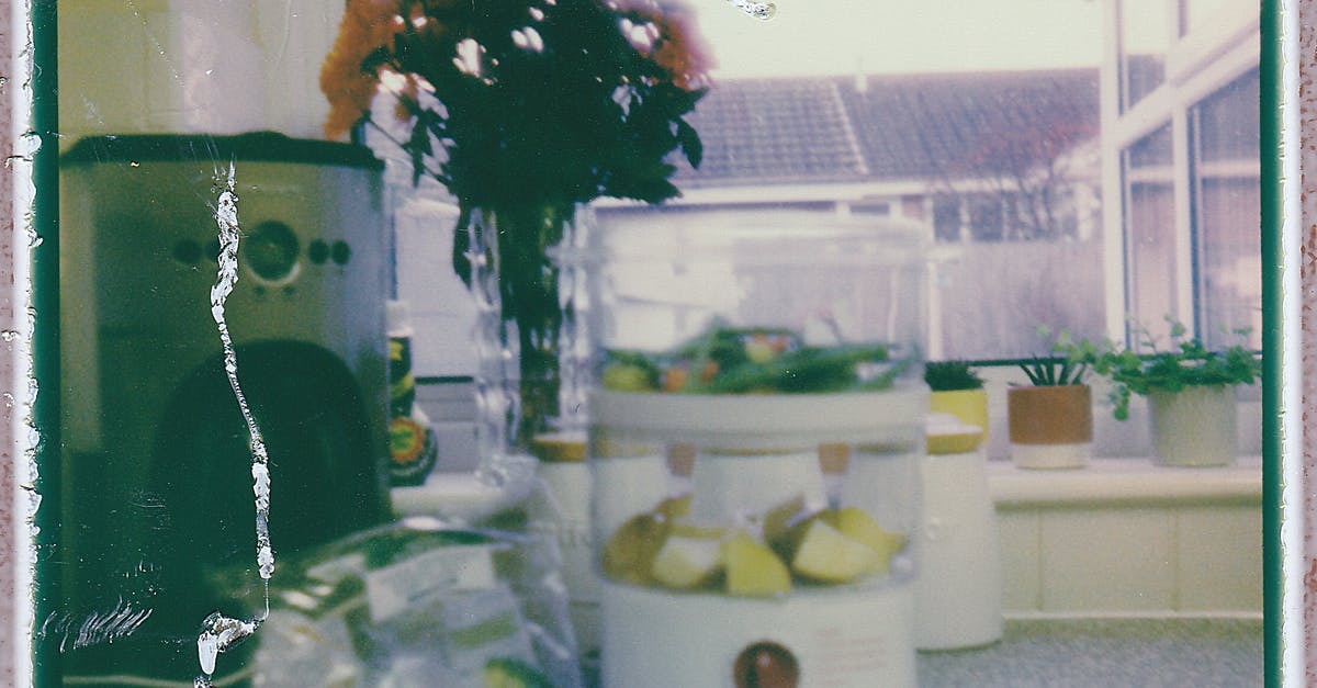 keep house hold chemicals bottles near food shelves - White Food Processor Photo keep house hold chemicals bottles near food shelves - White Food Processor Photo