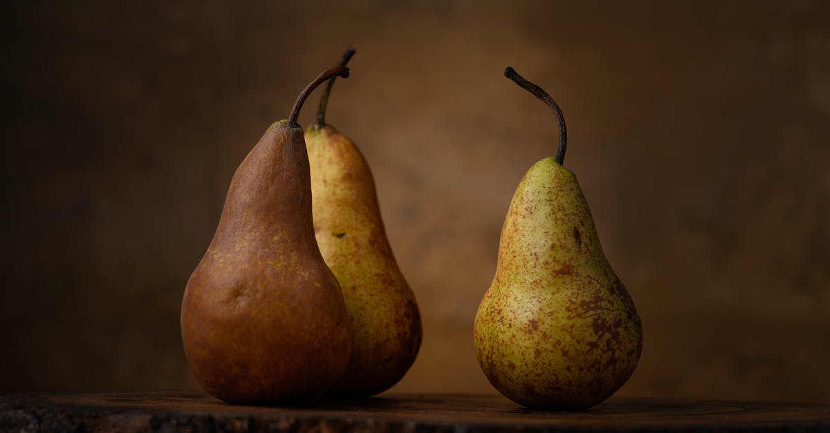 Keeping ripe pears for canning later - Pear Fruits on Brown Wooden Table Keeping ripe pears for canning later - Pear Fruits on Brown Wooden Table