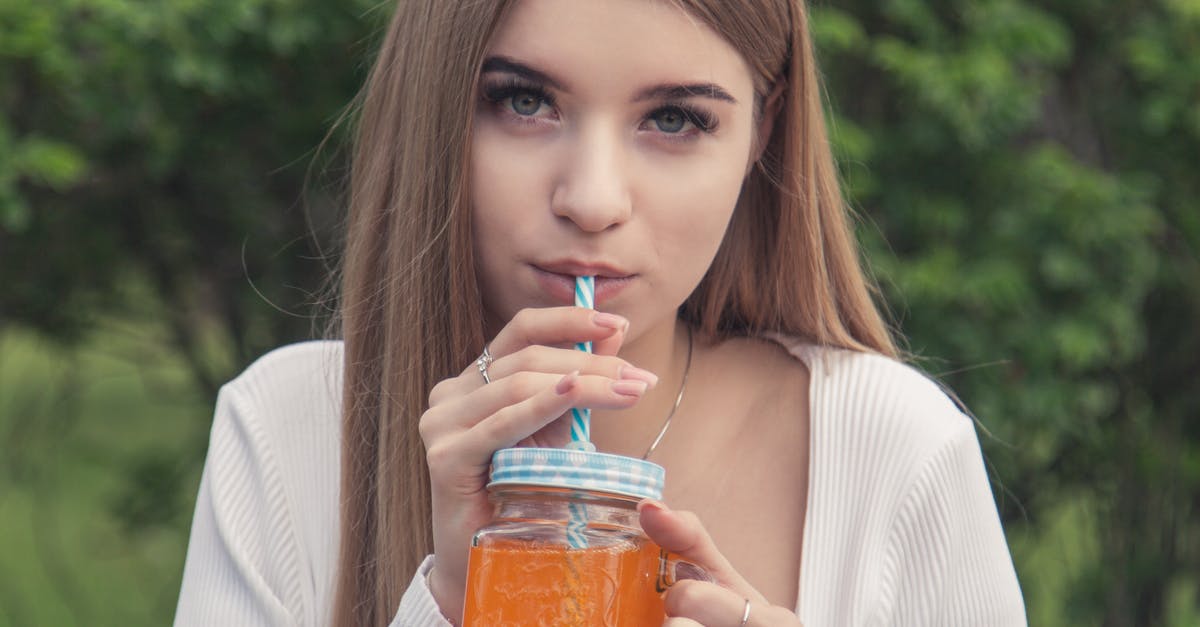 Kimchi in Mason Jars -- Too Sealed? - Woman in White Long Sleeve Shirt Holding Jar With Orange Liquid Kimchi in Mason Jars -- Too Sealed? - Woman in White Long Sleeve Shirt Holding Jar With Orange Liquid