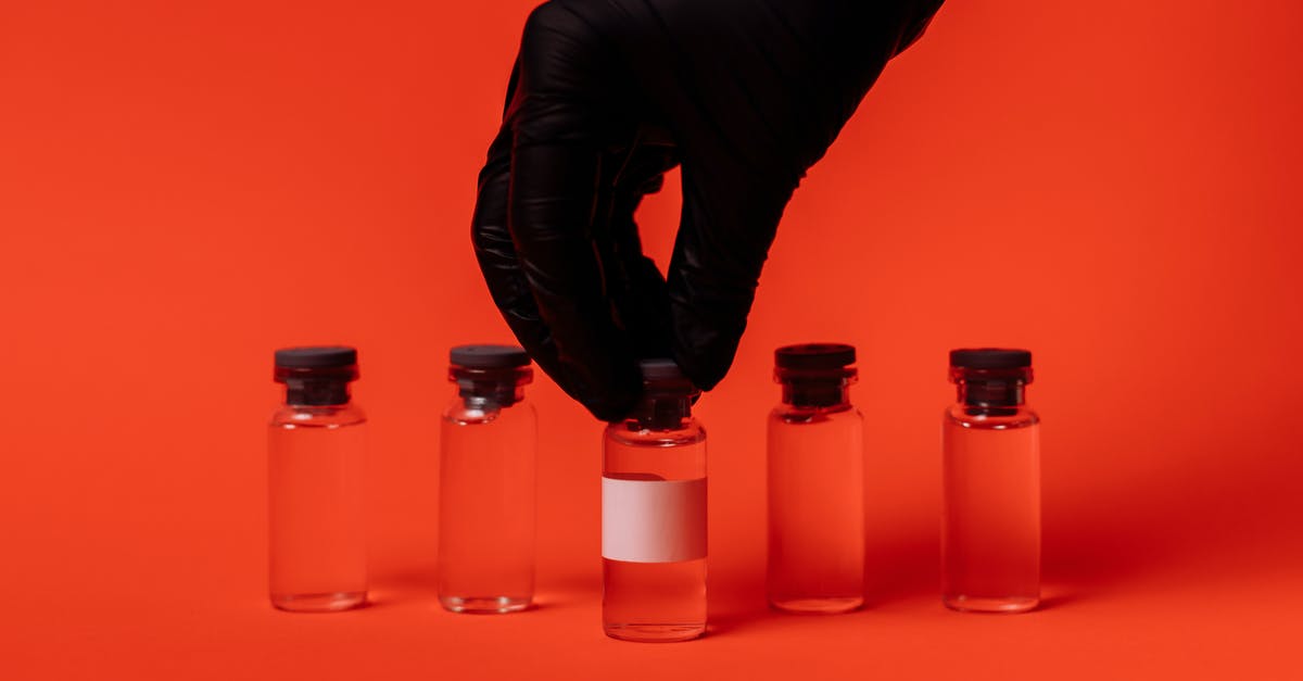 Kimchi versus pickles: sterilized containers? - Five Clear Glass Bottles on Table Kimchi versus pickles: sterilized containers? - Five Clear Glass Bottles on Table