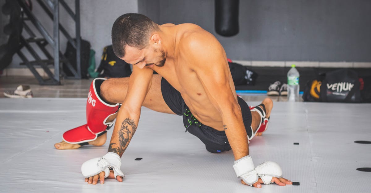 Kneading before or after rising? - Man in Black Shorts and Red Nike Shoes Sitting on Floor Kneading before or after rising? - Man in Black Shorts and Red Nike Shoes Sitting on Floor