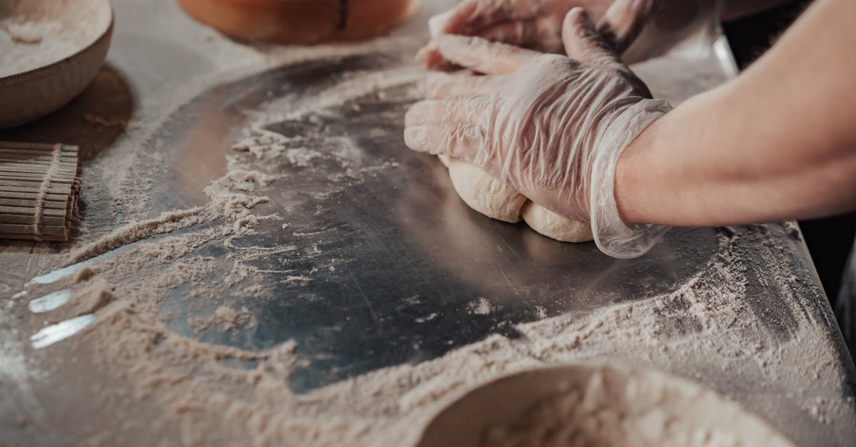 Kneading dough with long nails; latex gloves? - A Person Kneading a Dough Kneading dough with long nails; latex gloves? - A Person Kneading a Dough