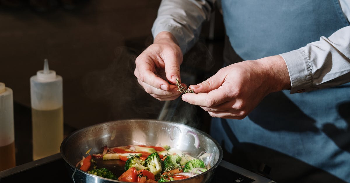 Lacto Fermented Vegetables - Off Flavors - Person Holding Stainless Steel Bowl With Vegetable Salad Lacto Fermented Vegetables - Off Flavors - Person Holding Stainless Steel Bowl With Vegetable Salad
