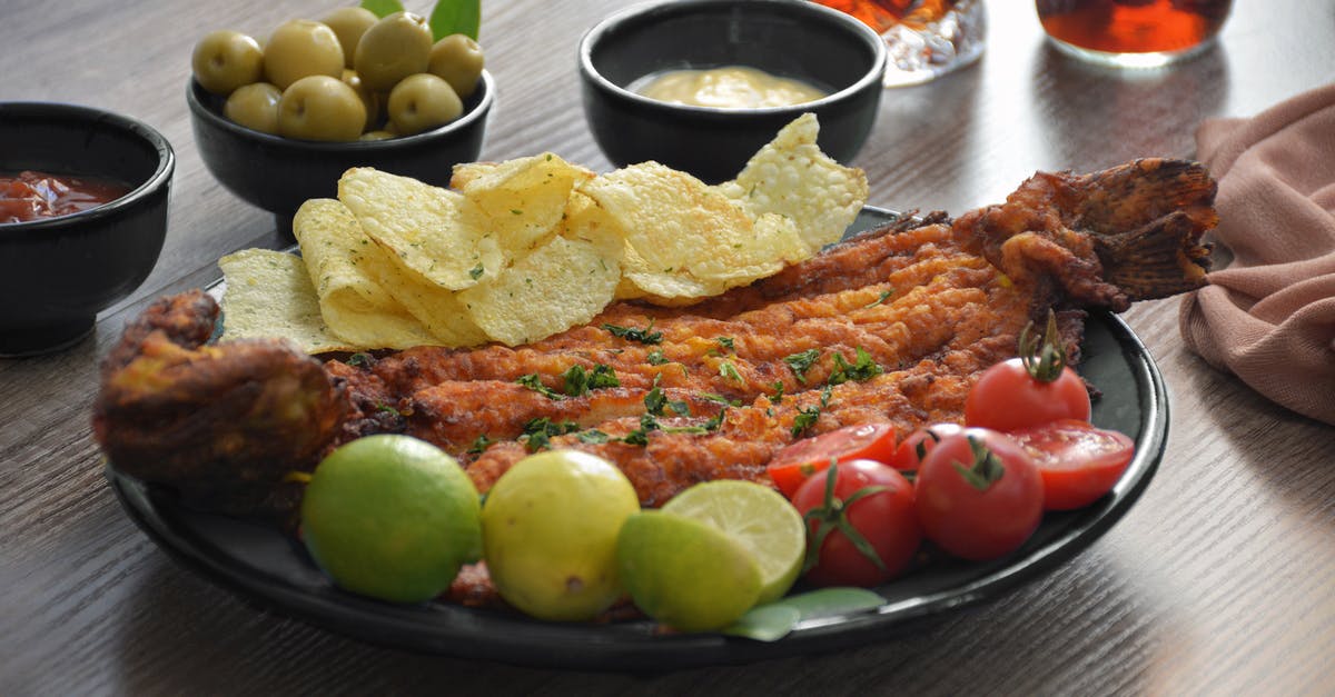 Lime on Fish tastes Bitter - Delicious fried fish and potato chips with salsas Lime on Fish tastes Bitter - Delicious fried fish and potato chips with salsas