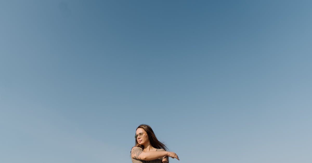 Long chilling of brioche dough? - Woman in Beige Sleeveless Dress Standing Under Blue Sky Long chilling of brioche dough? - Woman in Beige Sleeveless Dress Standing Under Blue Sky