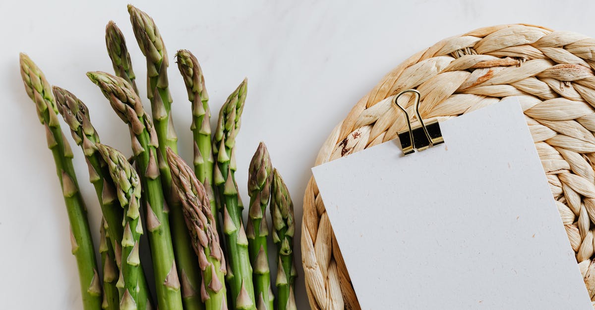 Looking for meal-planning / grocery list software - Overhead farming plants on white smooth surface with blank paper sheet fastened by paper clip Looking for meal-planning / grocery list software - Overhead farming plants on white smooth surface with blank paper sheet fastened by paper clip
