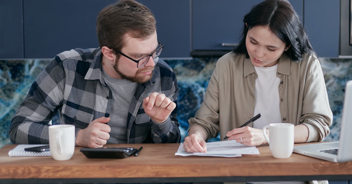 Looking to bake side dishes, having problems with dryness - A Couple Having Conversation while Looking at the Documents Looking to bake side dishes, having problems with dryness - A Couple Having Conversation while Looking at the Documents