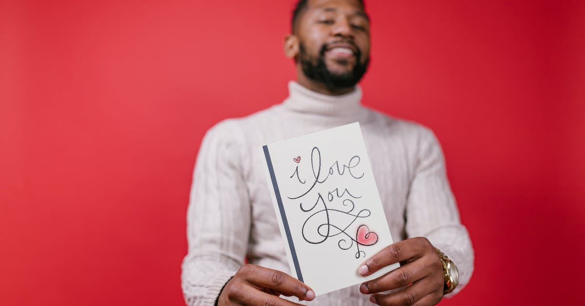 Looking to start cooking....but I'm a total noob. Where should I start? [duplicate] - Man in White Long Sleeve Shirt Holding Valentine's Day Card