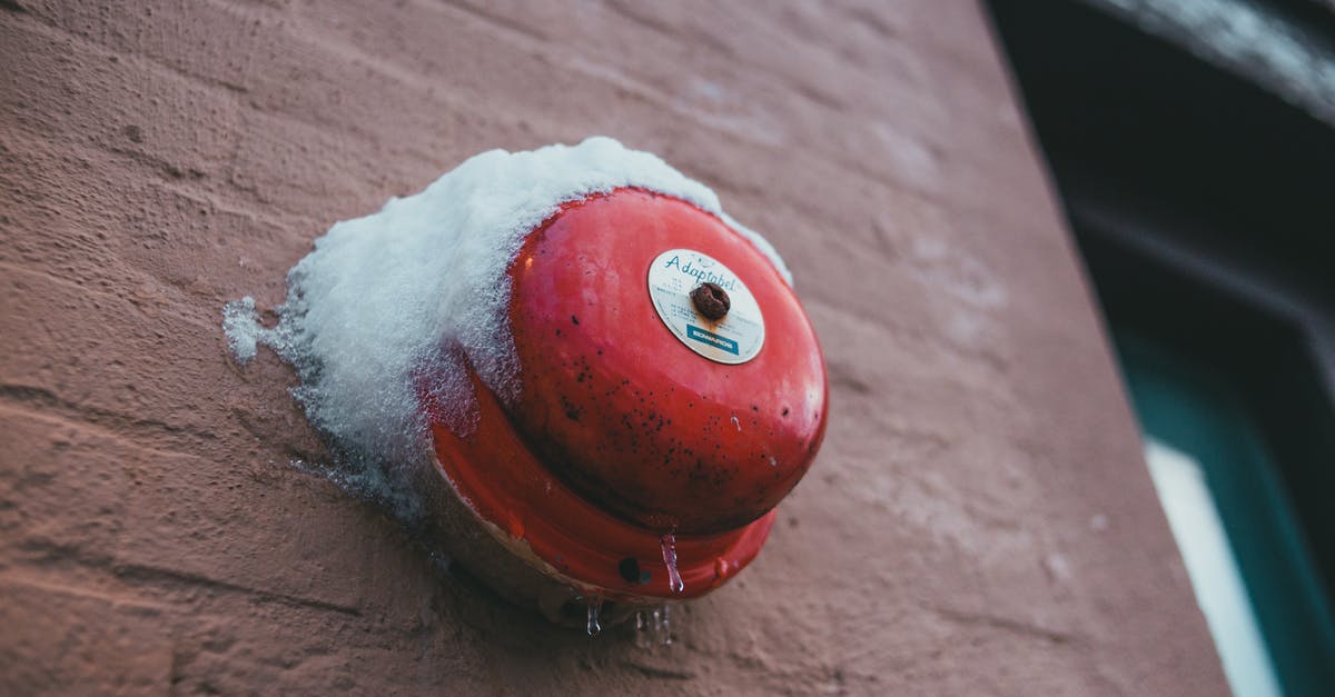Low tannin dry red wine, good for sauces and stews? - From below of fire alarm button with snow and icicles on rough wall of house in winter town Low tannin dry red wine, good for sauces and stews? - From below of fire alarm button with snow and icicles on rough wall of house in winter town