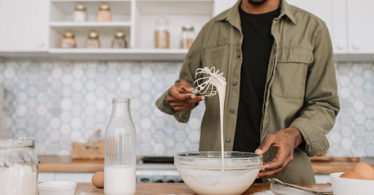 Low-fat quark plus blended blueberries -- texture changes over night? - A Man Checking the Texture of the Batter Low-fat quark plus blended blueberries -- texture changes over night? - A Man Checking the Texture of the Batter