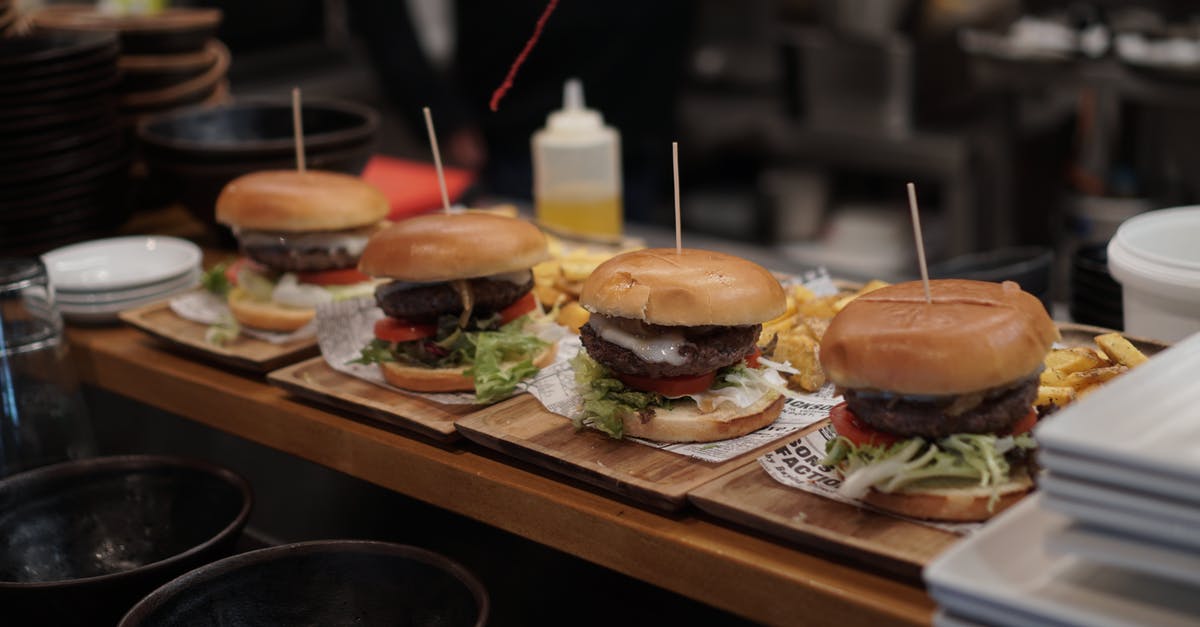 Lunch meat is slimy on outside? - Burger With Lettuce and Tomato on Brown Wooden Tray Lunch meat is slimy on outside? - Burger With Lettuce and Tomato on Brown Wooden Tray