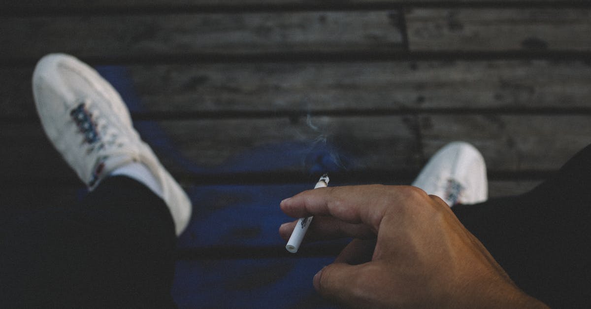 Mackerel brining time before smoking - Person Holding Cigarette Stick Mackerel brining time before smoking - Person Holding Cigarette Stick