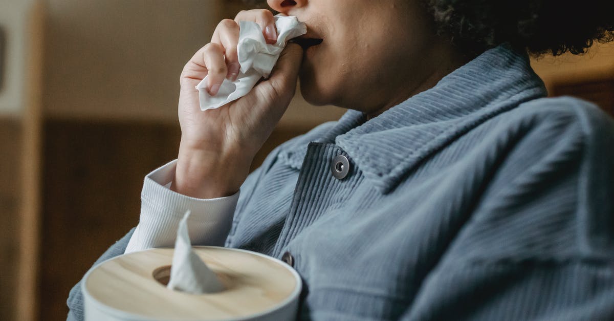 Maillard Reaction at Higher Pressures - Black crying woman wiping nose with tissue Maillard Reaction at Higher Pressures - Black crying woman wiping nose with tissue