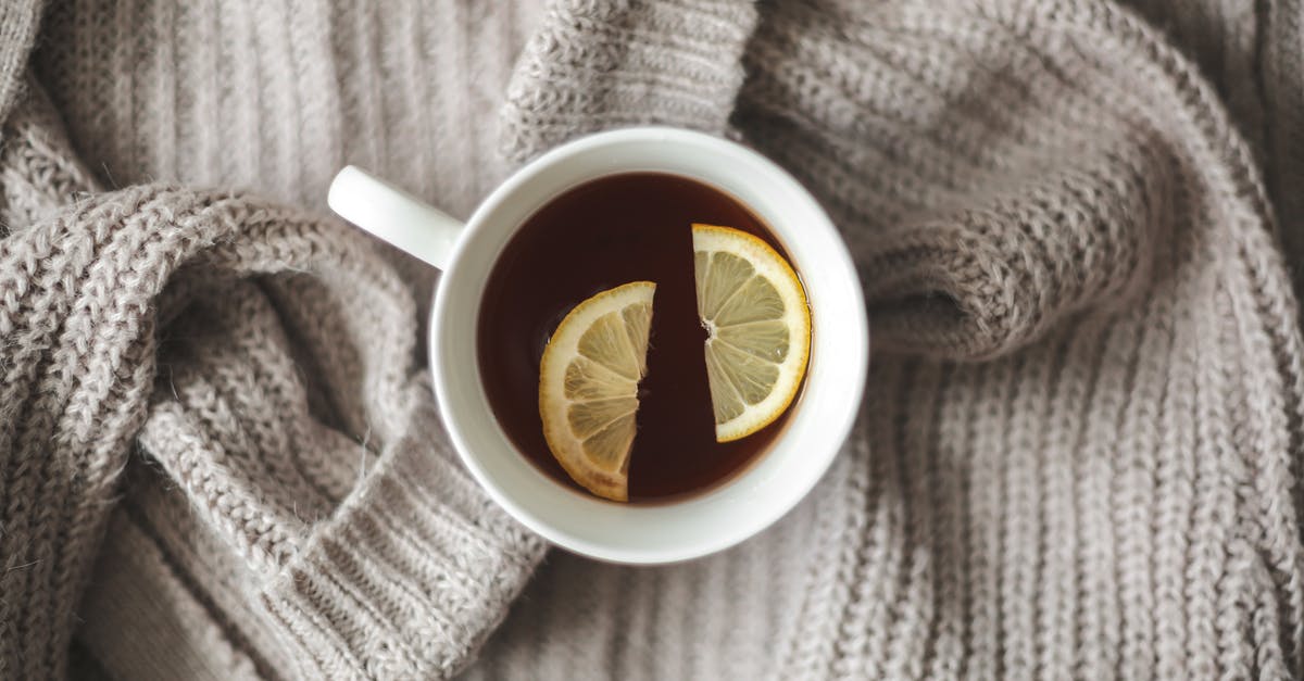 Make lemon balm tea - recommended method - White Ceramic Mug With Yellow and Black Flower Make lemon balm tea - recommended method - White Ceramic Mug With Yellow and Black Flower